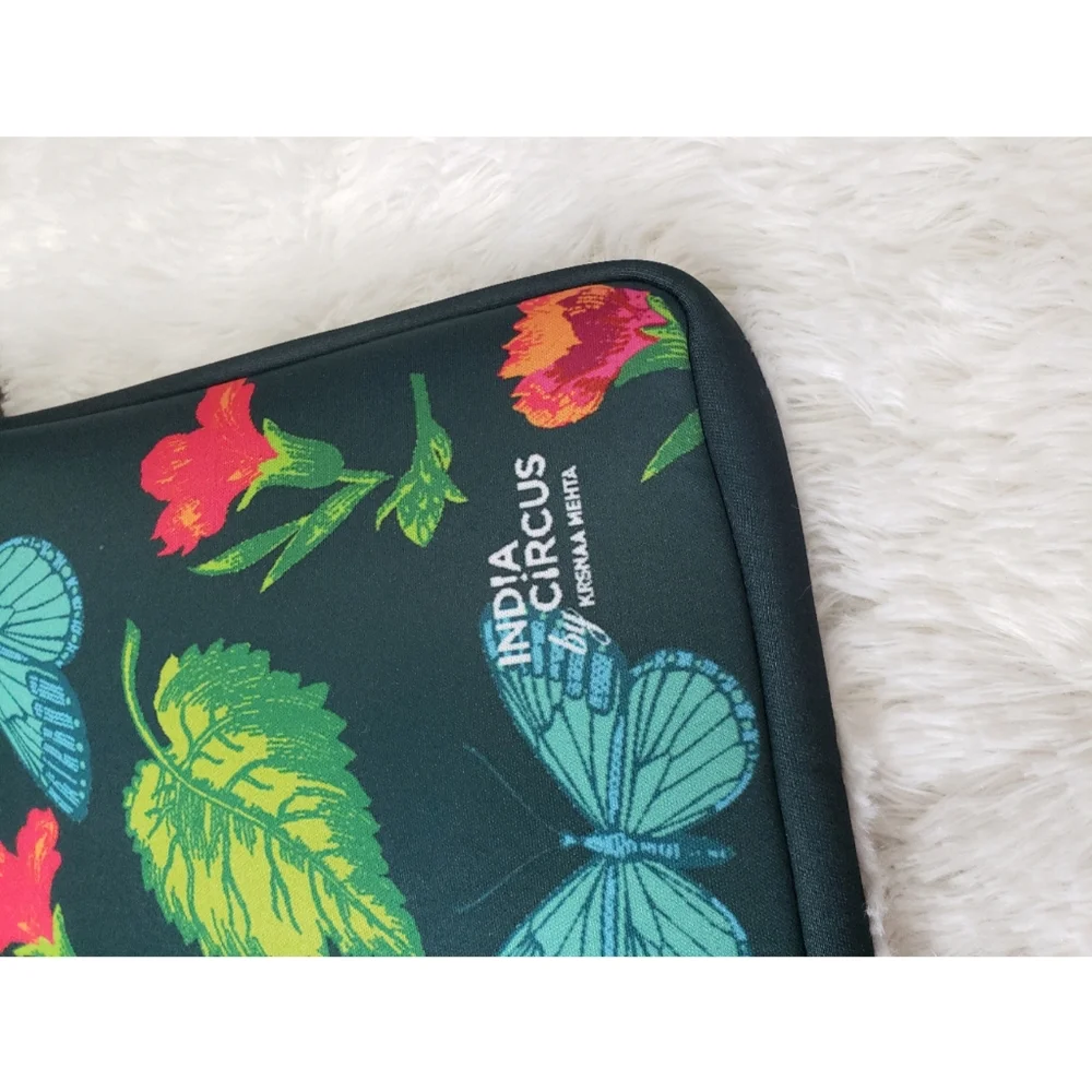 India circus by krsnaa mehta butterfly green floral laptop case